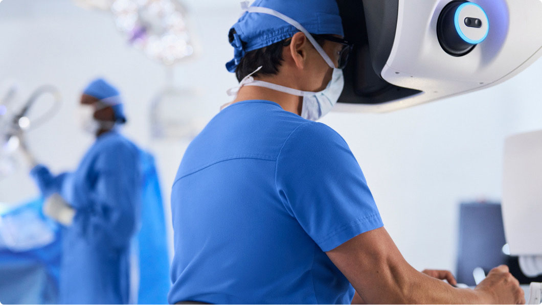 surgeon at console